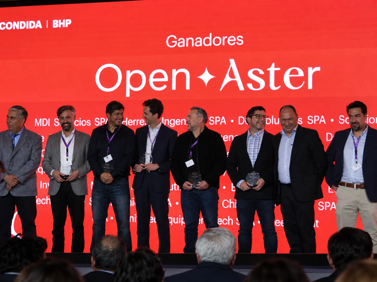 Representatives of the winning companies receiving their Open Aster 2026 award on stage